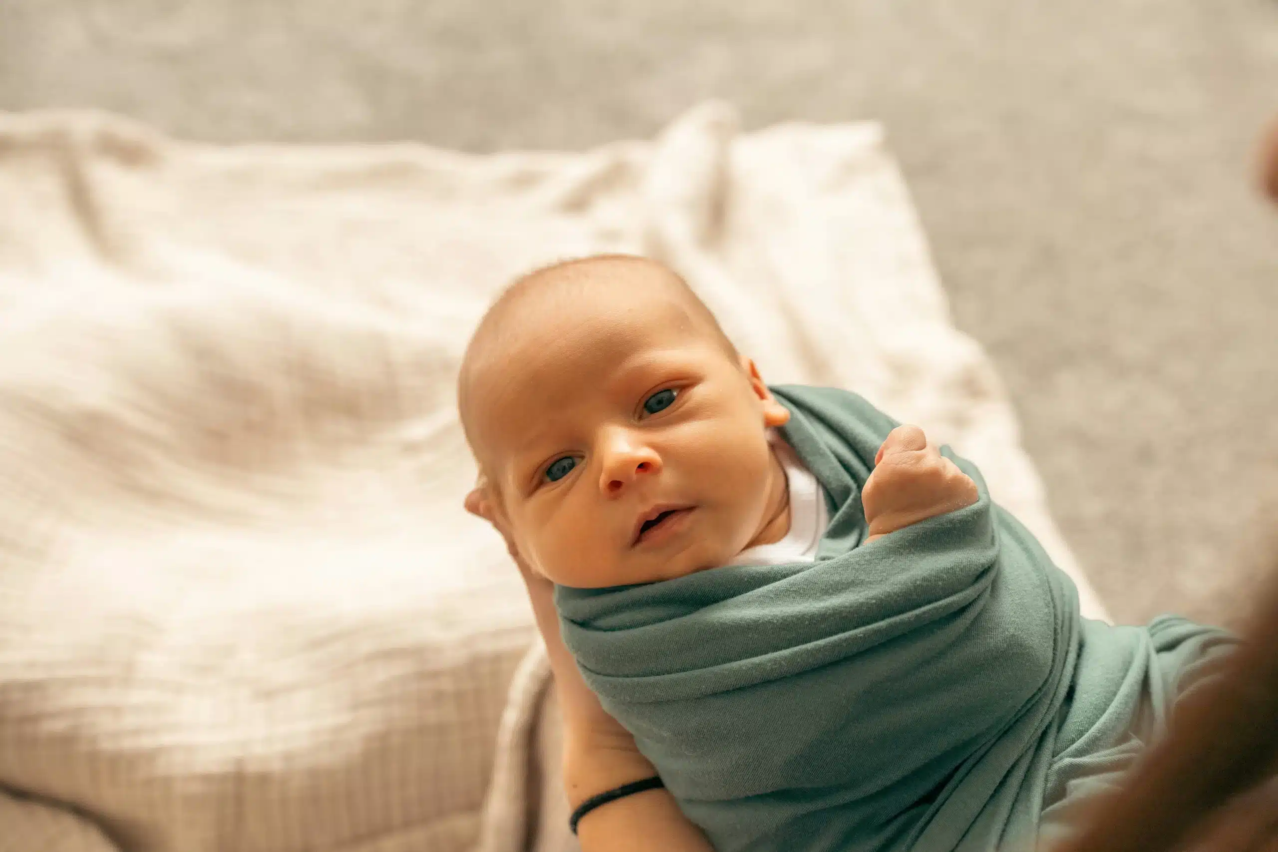 A newborn baby in need of infant chiropractic care.